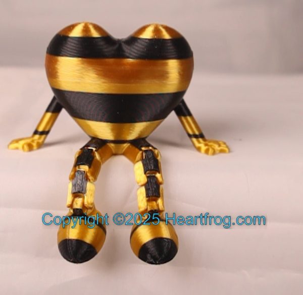 Hanging ornament, Bling, or sit it on display. Always a smile. Size: 73mm